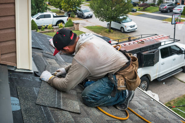 Professional Roofing technician working in Crandall, TX